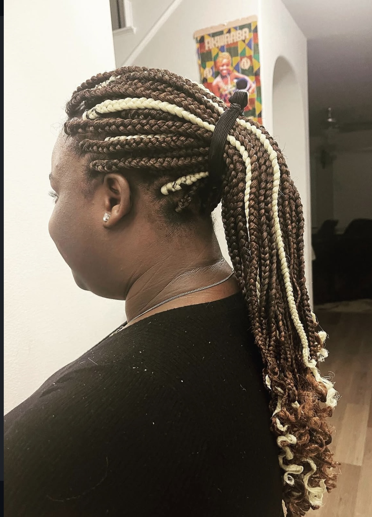 Knotless Braids — cornrow base in progress